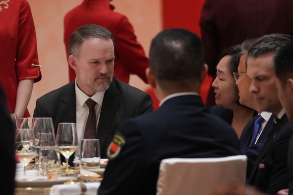U.S. Trade Representative Jamieson Greer, left, attend a state dinner with President Donald Trump and Chinese President Xi Jinping at the Great Hall of the People on Thursday May 14, 2026, in Beijing. ...