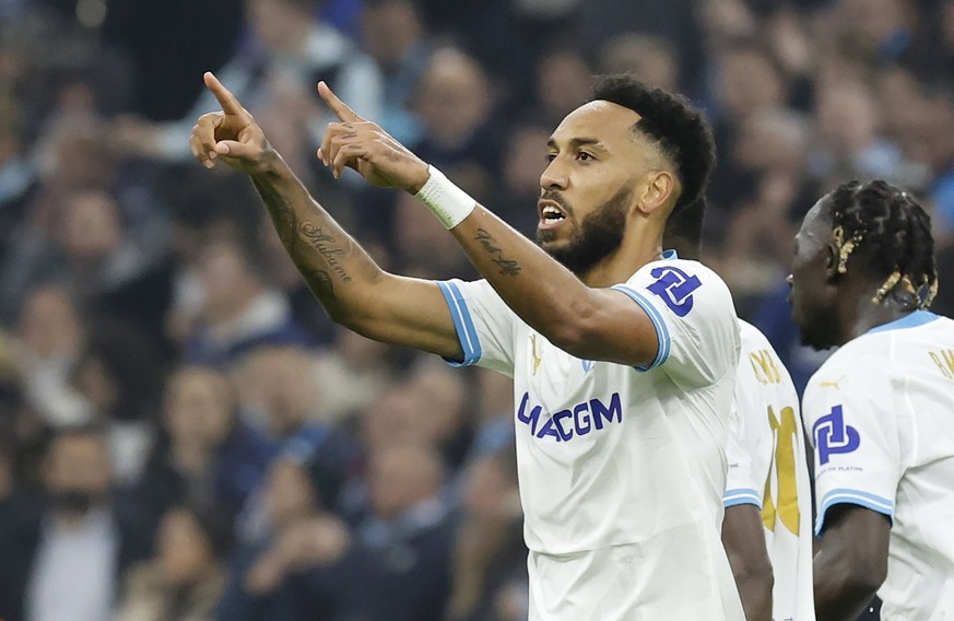 epa11173377 Pierre-Emerick Aubameyang of Marseille celebrates after scoring the 1-1 during the UEFA Europa League knock- out round play-offs, 2nd leg soccer match between Olympique Marseille and Shakt ...