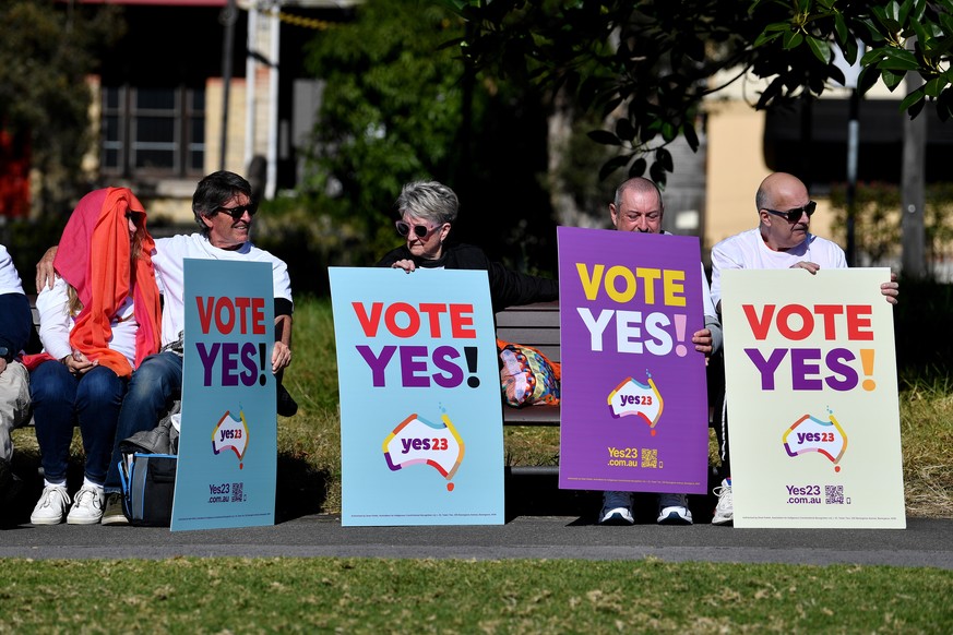 epa10722127 Supporters hold placards during a &#039;Yes23&#039; community event in support of an Indigenous Voice to Parliament, in Sydney, New South Wales, Australia, 02 July 2023. Thousands rallied  ...