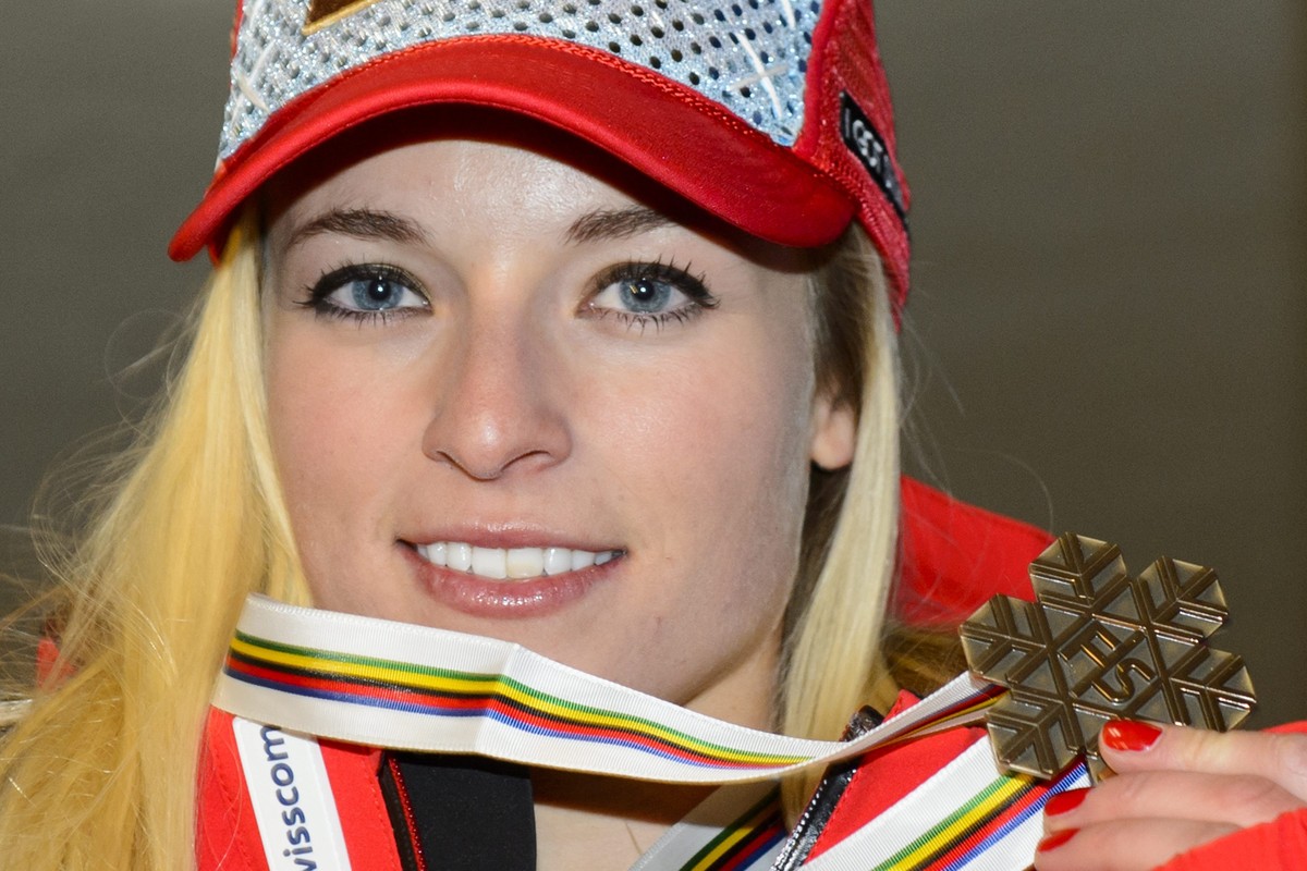 epa04606909 Lara Gut of Switzerland, bronze medal, smiles for photographer after the women's downhill medal ceremony at the 2015 Alpine World Skiing Championships in Vail / Beaver Creek, Colorado ...