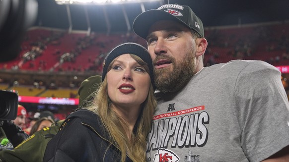 FILE - Kansas City Chiefs tight end Travis Kelce, right, appears with singer Taylor Swift after the Chiefs victory over the Buffalo Bills in the AFC Championship game in Kansas City, Mo., on Jan. 26,  ...