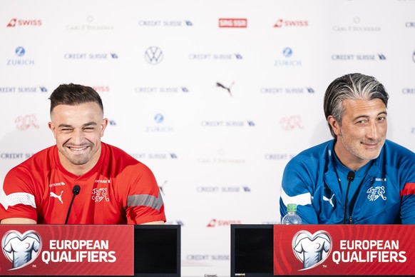 Switzerland&#039;s head coach Murat Yakin, right, and Switzerland&#039;s midfielder Xherdan Shaqiri attend a press conference of the national soccer team one day before the UEFA Euro 2024 qualifying g ...