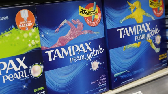 Boxes of tampons are displayed in a pharmacy, Monday, March 7, 2016, in New York. A group of women has filed a lawsuit accusing New York of unlawfully taxing tampons and other feminine hygiene product ...