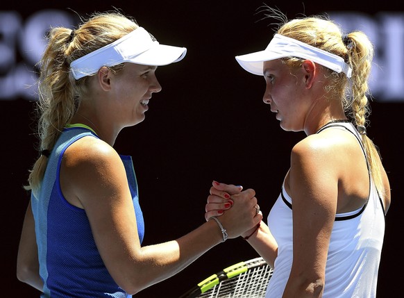 epa05729298 Caroline Wozniacki of Denmark (L) is congratulated on her win by Donna Vekic of Croatia (R) during round two of the Women&#039;s Singles at the Australian Open Grand Slam tennis tournament ...