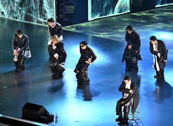 epa12838528 K-pop group BTS performs during the 'BTS THE COMEBACK LIVE | ARIRANG' concert on Gwanghwamun Square in central Seoul, South Korea, 21 March 2026. EPA/YONHAP / POOL SOUTH KOREA OU ...