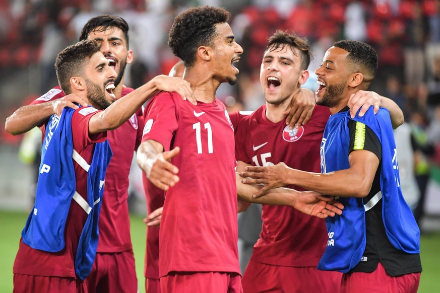 Akram Afif, center, and his teammates of Qatar celebrate after scoring a goal against Saudi Arabia in the 2019 AFC Asian Cup group E football match between Saudi Arabia and Qatar in Abu Dhabi, United  ...