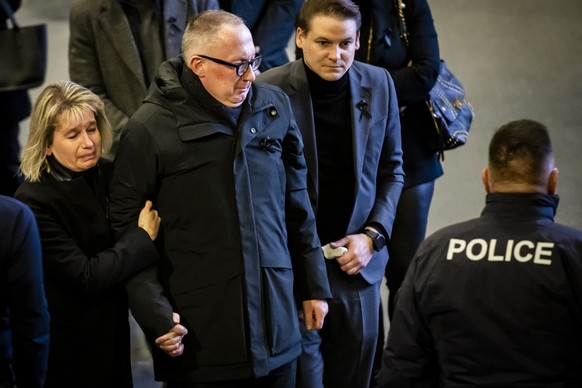 KEYPIX - Nicolas Feraud, Mayor of Crans-Montana reacts in memory of the victims as they watch on a screen in "Le Regent Congress hall" the official commemorative ceremony during the national ...