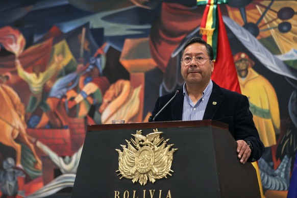 epa11442390 Bolivian President Luis Arce speaks during a press conference in La Paz, Bolivia, 27 June 2024. On 26 June, a group of soldiers led by Bolivian Army general commander Juan Jose Zuniga ente ...