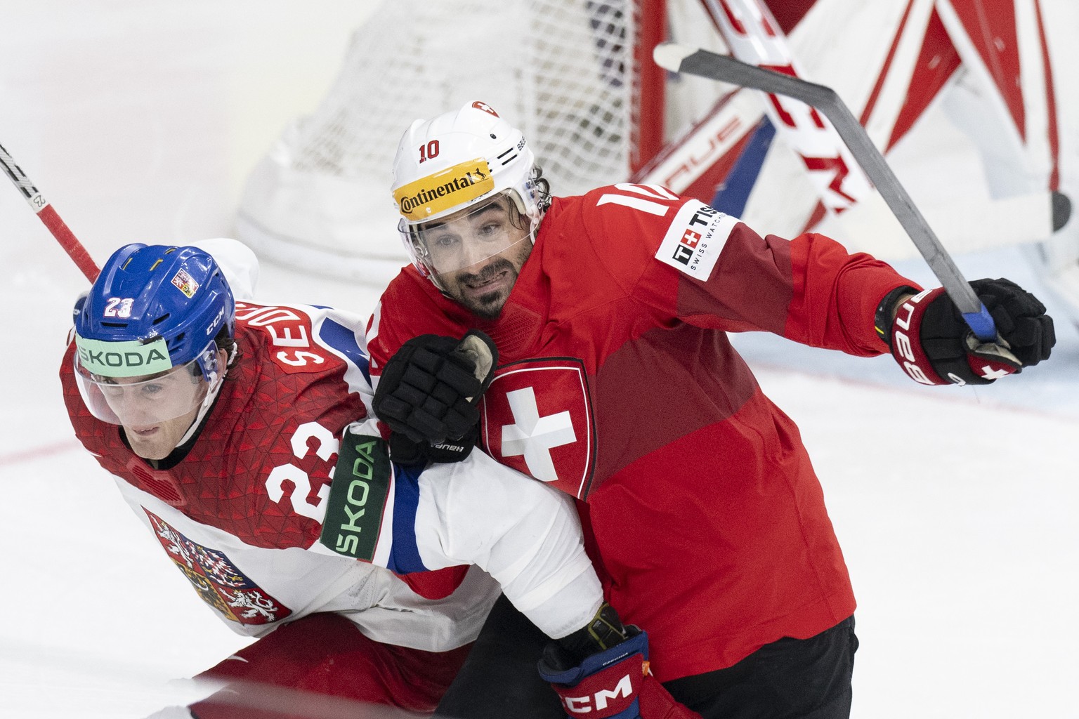 CAPTION CORRECTION: CORRECTS PLAYER ON THE RIGHT - Switzerland&#039;s Andres Ambuehl, right, in action against Czech Republic&#039;s Lukas Sedlak during the Ice Hockey World Championship final match b ...