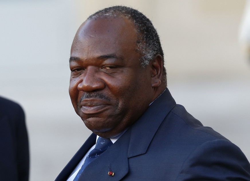 FILE-In this file photo taken on Tuesday, Nov. 10, 2015, Gabon&#039;s President Ali Bongo Ondimba, leaves the Elysee Palace after a meeting with French President Francois Hollande as part of preparati ...