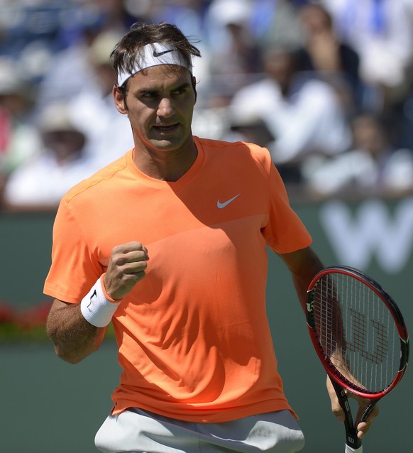 epa04672036 Roger Federer of Switzerland reacts during his quarter-final match against Tomas Berdych of the Czech Republic at the BNP Paribas Open tennis tournament in Indian Wells, California, USA, 2 ...