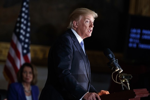 President Donald Trump speaks during a Congressional Gold Medal ceremony honoring former Sen, Bob Dole on Capitol Hill, Wednesday, Jan. 17, 2018, in Washington. (AP Photo/Evan Vucci)