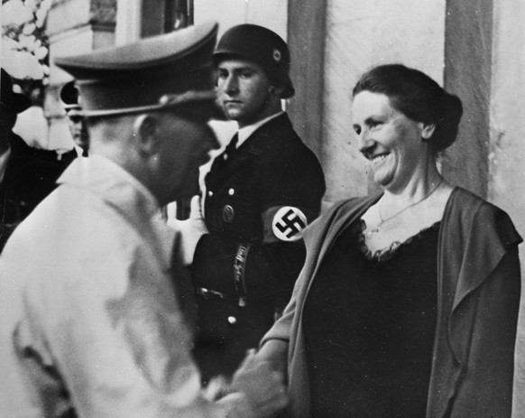 Winifred Wagner (Winifred Marjorie Williams), widow of Siegfried Wagner, welcomes Adolf Hitler with a big smile, Tuesday July 26, 1939 for the opening of the Bayreuth Wagner Opera Festival staging &qu ...