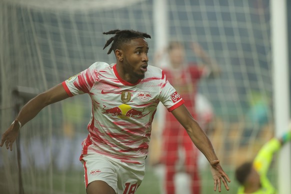 epa09964129 Leipzig&#039;s Christopher Nkunku celebrates after scoring the equalizer during the German DFB Cup Final between SC Freiburg and RB Leipzig in Berlin, Germany, 21 May 2022. EPA/Friedemann  ...