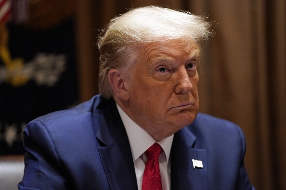 President Donald Trump listens during a roundtable meeting with Hispanic leaders in the Cabinet Room, Thursday, July 9, 2020, in Washington. (AP Photo/Evan Vucci)
Donald Trump