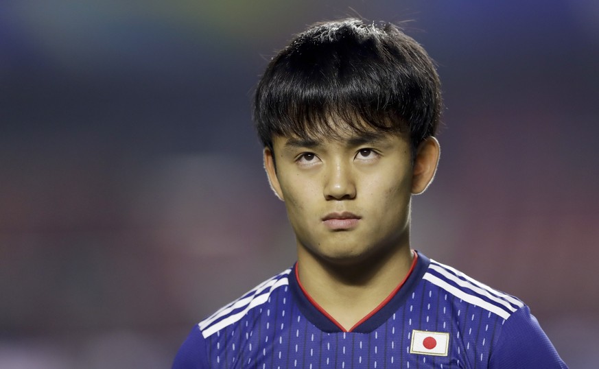 Japan&#039;s Takefusa Kubo listen to the national anthems prior to a Copa America Group C soccer match against Chile&#039;s at the Morumbi stadium in Sao Paulo, Brazil, Monday, June 17, 2019. (AP Phot ...