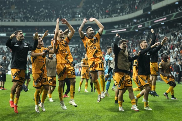 Lugano players celebrate at the end of the Europa Conference League, group D soccer match between Besiktas and Lugano, in Istanbul, Turkey, Thursday Oct. 5, 2023. (AP Photo/Francisco Seco)