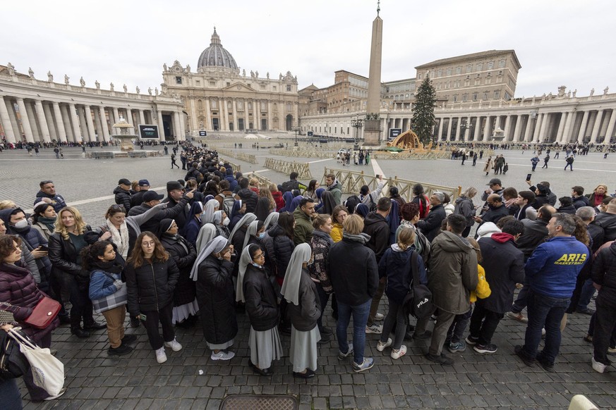 epa10386084 Nuns, priests and faithful gather in St. Peter&#039;s Basilica to pay their respects to Benedict XVI in the Vatican, 02 January 2023. Former Pope Benedict XVI died on 31 December at his Va ...