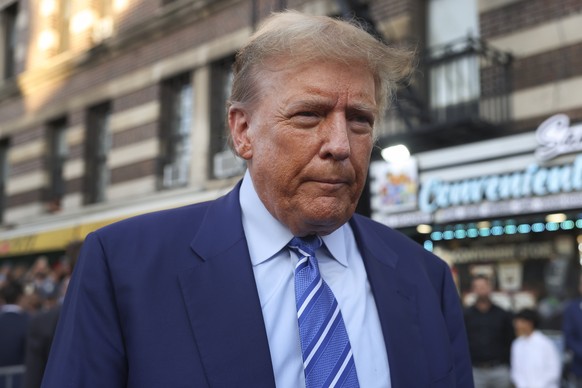 Former president Donald Trump, talks to members of the media while visiting a bodega, Tuesday, April 16, 2024, who&#039;s owner was attacked last year in New York. Fresh from a Manhattan courtroom, Do ...