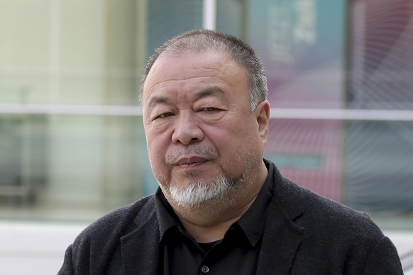 FILE - Chinese artist Ai Weiwei poses for the media during an &quot;I am a Hong Konger! Discussing Human Rights and Democracy&quot; panel discussion hosted by the faction of the German Liberals at the ...