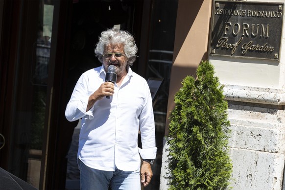 Five Star Movement (M5S) co-founder Beppe Grillo leaves the Forum Hotel in Rome, Sunday, July 1, 2018. (Massimo Percossi/ANSA via AP)