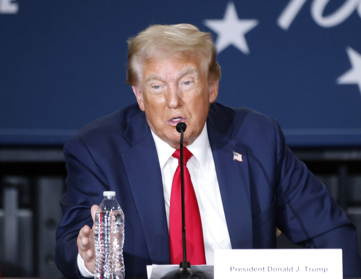 epa11656575 Republican presidential candidate and former President Donald Trump speaks during a Hispanic roundtable as part of the America's Future Tour of the organization Building America' ...