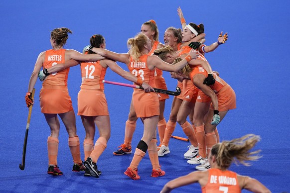 The Netherlands celebrates their 3-1 victory over Argentina to win the women&#039;s gold medal field hockey match during the 2020 Summer Olympics, Friday, Aug. 6, 2021, in Tokyo, Japan. (AP Photo/John ...