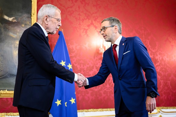 epa11808709 Austrian Federal President Alexander Van der Bellen (L) welcomes chairman of the Freedom Party of Austria (FPOe) Herbert Kickl (R) during their meeting in Vienna, Austria, 06 January 2025. ...
