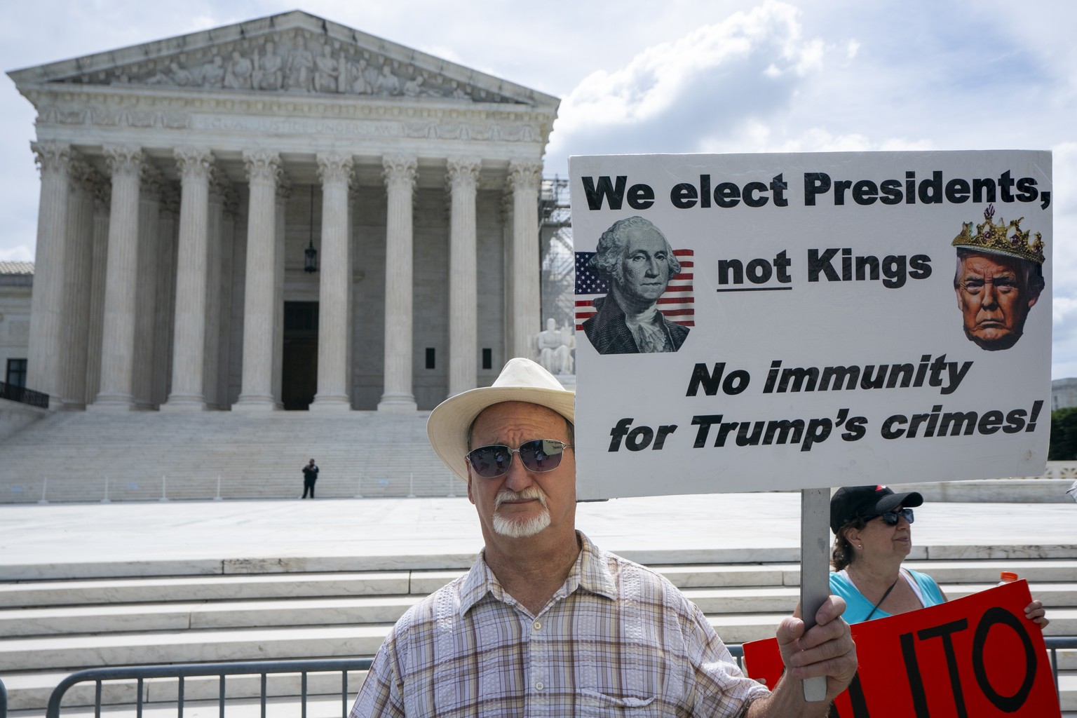 epa11441675 Anti-Trump activists protest at the Supreme Court in Washington, DC, USA, 27 June 2024. In a temporary victory for abortion-rights advocates the Supreme Court dismissed the high profile Id ...