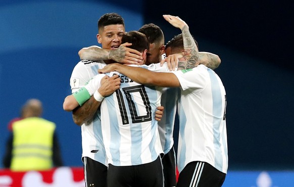 epa06842861 Lionel Messi of Argentina (C, front) celebrates with teammates during the FIFA World Cup 2018 group D preliminary round soccer match between Nigeria and Argentina in St.Petersburg, Russia, ...