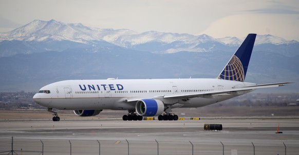 FILE - A United Airlines jetliner taxis to a runway for take off from Denver International Airport, Dec. 27, 2022. Federal investigators said Thursday, Aug. 10, 2023, that miscommunication between pil ...