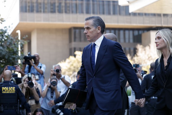 epa11588363 Hunter Biden (C), and his wife Melissa Cohen Biden (R), leave the First Street US Courthouse in Los Angeles, California, USA, 05 September 2024. Hunter Biden pleaded guilty to nine charges ...