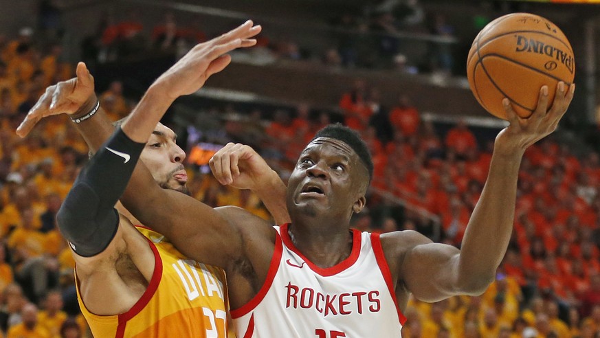 FILE - In this May 4, 2018, file photo, Utah Jazz center Rudy Gobert (27) defends against Houston Rockets center Clint Capela (15) during the first half in Game 3 of an NBA basketball second-round pla ...