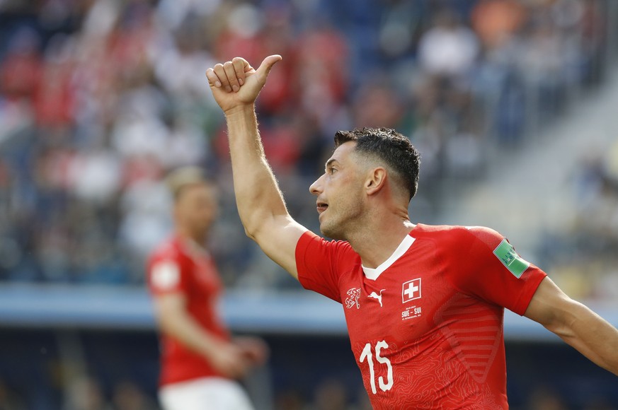 Switzerland&#039;s Blerim Dzemaili gestures during the round of 16 match between Switzerland and Sweden at the 2018 soccer World Cup in the St. Petersburg Stadium, in St. Petersburg, Russia, Tuesday,  ...