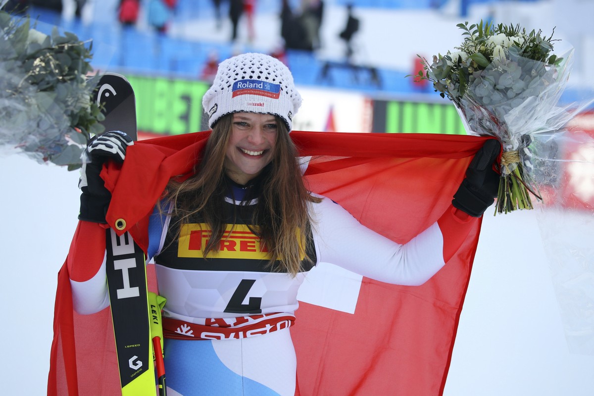 Switzerland's Corinne Suter celebrates taking third place in the women's super G during the alpine ski World Championships, in Are, Sweden, Tuesday, Feb. 5, 2019. (AP Photo/Marco Trovati)