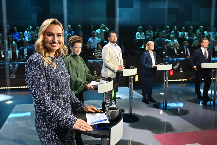 epa13229479 (L-R) Christian Democrats party leader Ebba Busch (KD), Green Party spokesperson Amanda Lind (MP), Sweden Democrats party leader Jimmie Åkesson (SD), Social Democrats party leader Magdalen ...