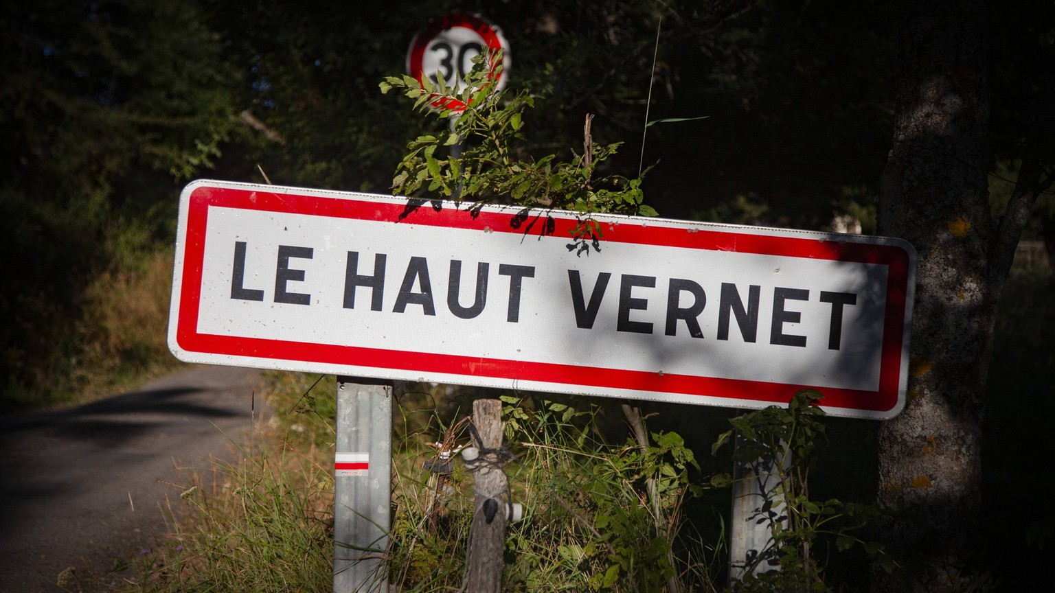 Missing French Toddler Case - Le Haut Vernet The road leading to Haut-Vernet with the sign indicating the entrance to the village, France on August 8th, 2023, marks one month since the disappearance o ...