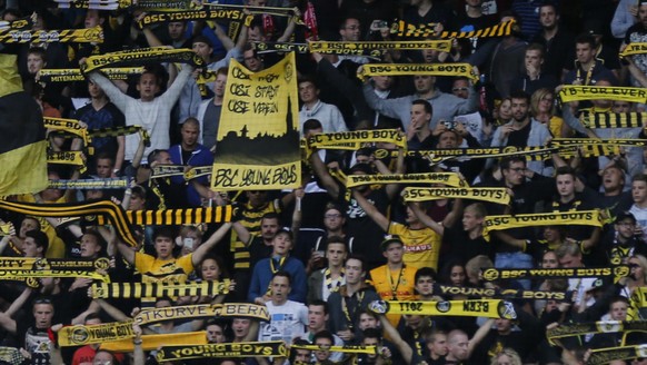 Bern&#039;s fans cheer for their team prior to the UEFA Champions League third qualifying round first leg soccer match between Switzerland’s BSC Young Boys Bern and AS Monaco at the Stade de Suisse st ...