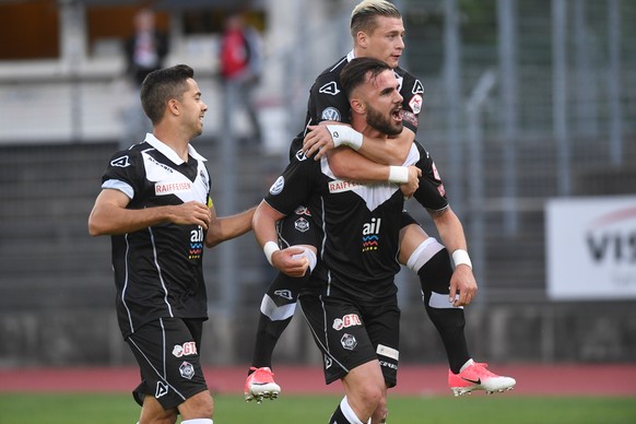 Lugano&#039;s player Armando Sadiku, center, celebrates the 1-0 goal with Lugano&#039;s player Ezgjan Alioski and Lugano&#039;s player Jonathan Sabbatini, during the Super League soccer match FC Lugan ...