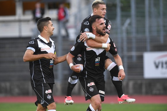 Lugano&#039;s player Armando Sadiku, center, celebrates the 1-0 goal with Lugano&#039;s player Ezgjan Alioski and Lugano&#039;s player Jonathan Sabbatini, during the Super League soccer match FC Lugan ...