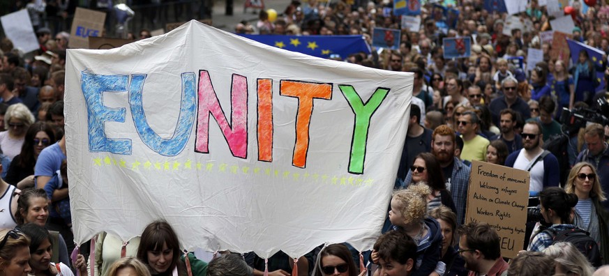 People hold banners during a &#039;March for Europe&#039; demonstration against Britain&#039;s decision to leave the European Union, in central London, Britain July 2, 2016. Britain voted to leave the ...