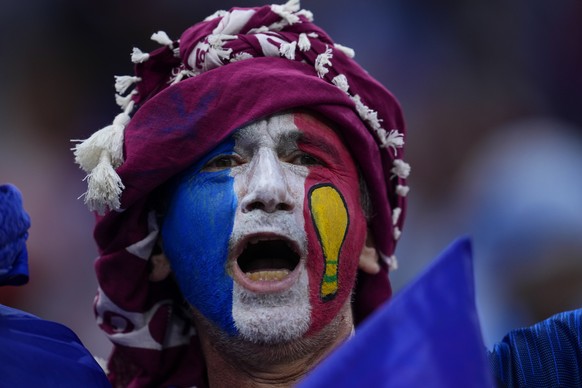 A fan of France cheers prior to the World Cup final soccer match between Argentina and France at the Lusail Stadium in Lusail, Qatar, Sunday, Dec. 18, 2022. (AP Photo/Natacha Pisarenko)