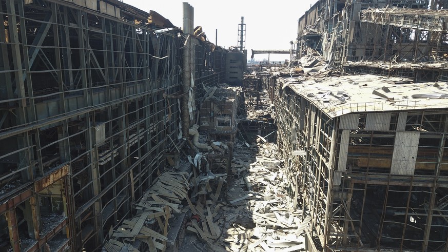 In this photo released by the Russian Defense Ministry on Monday, June 13, 2022, a view of the Metallurgical Combine Azovstal plant, in Mariupol, on the territory which is under the Government of the  ...