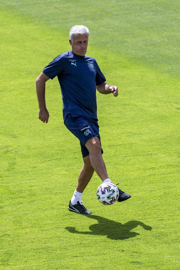 Switzerland&#039;s head coach Vladimir Petkovic plays the bal during a training session for the Euro 2020 soccer tournament at the Tre Fontane sports centre, in Rome, Italy, Tuesday, June 22, 2021. (K ...