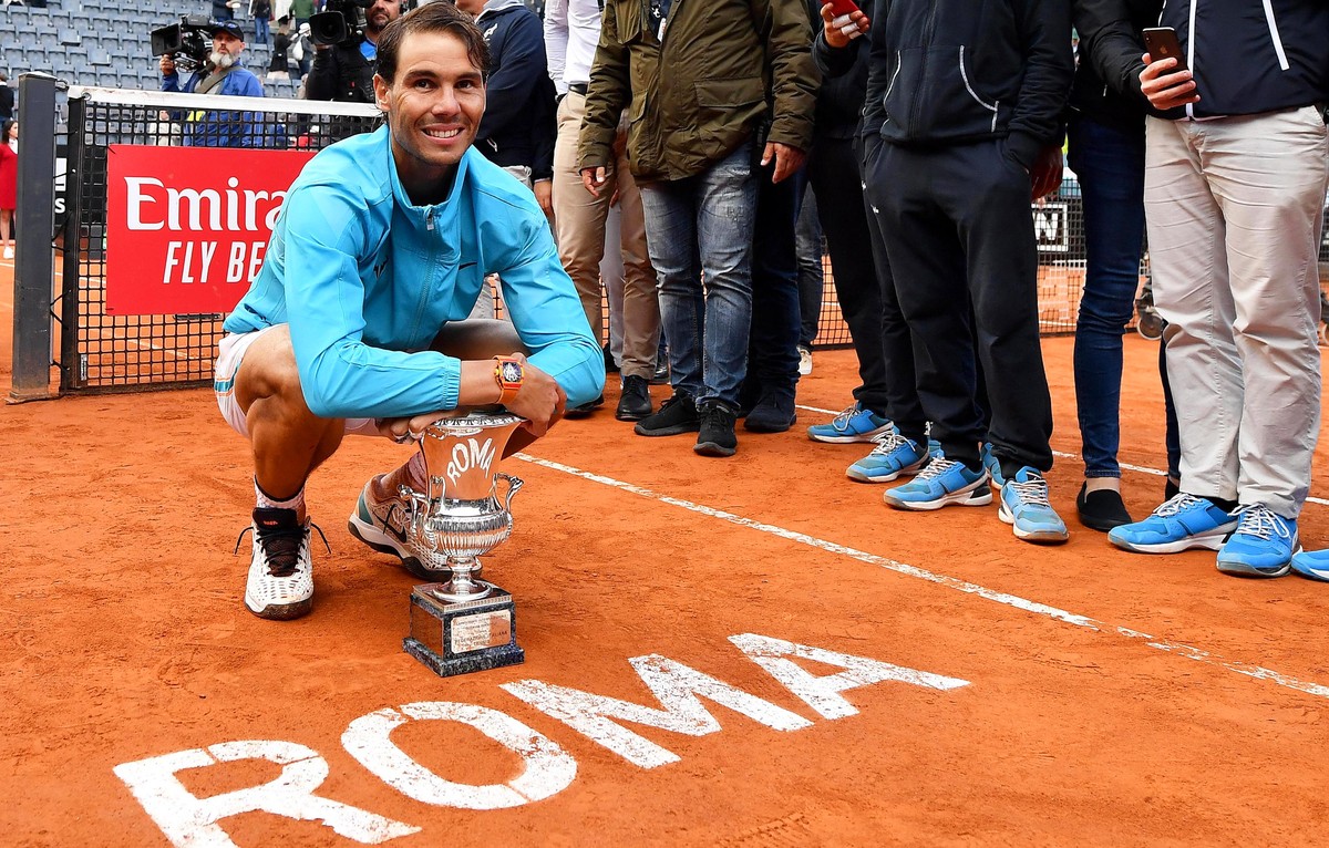 epa07585050 Rafael Nadal of Spain poses with his trophy after defeating Novak Djokovic of Serbia in their men's singles final match at the Italian Open tennis tournament in Rome, Italy, 19 May 20 ...