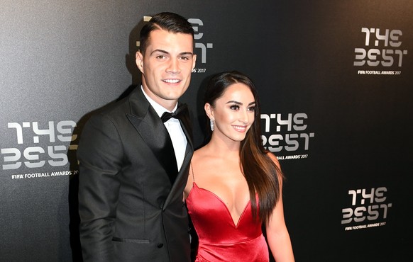 epa06284752 Arsenal midfielder and Swiss international Granit Xhaka (L) and his wife Leonita Lekaj arrive for the Best FIFA Football Awards 2017 at the London Palladium, London, Britain 23 October 201 ...