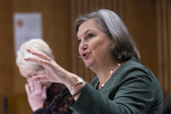 Under Secretary of State for Political Affairs Victoria Nuland with Assistant Secretary of Defense for International Security Affairs Celeste Wallander, back left, testifies before a Senate Foreign Re ...