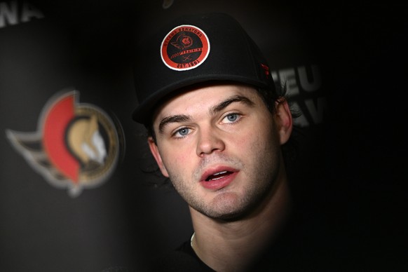 Ottawa Senators&#039; Alex DeBrincat speaks to reporters during the team&#039;s NHL hockey training camp in Ottawa, Thursday, Sept. 22, 2022. (Justin Tang/The Canadian Press via AP)