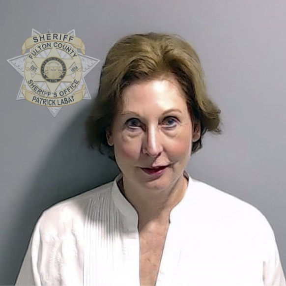 This booking photo provided by the Fulton County Sheriff&#039;s Office shows Sidney Powell on Wednesday, Aug. 23, 2023, in Atlanta, after she surrendered and was booked. Powell is charged alongside fo ...