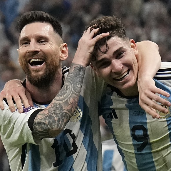 Argentina&#039;s Lionel Messi, left, and Argentina&#039;s Julian Alvarez celebrate after scoring during the World Cup semifinal soccer match between Argentina and Croatia at the Lusail Stadium in Lusa ...